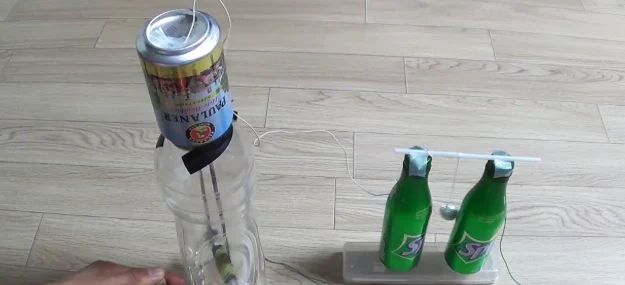 Homemade electrostatic generator made from a soda can and plastic bottles